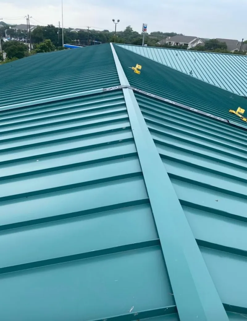 Green commercial metal roof ridge and valley for Metal Roof Repair in Mount Carmel